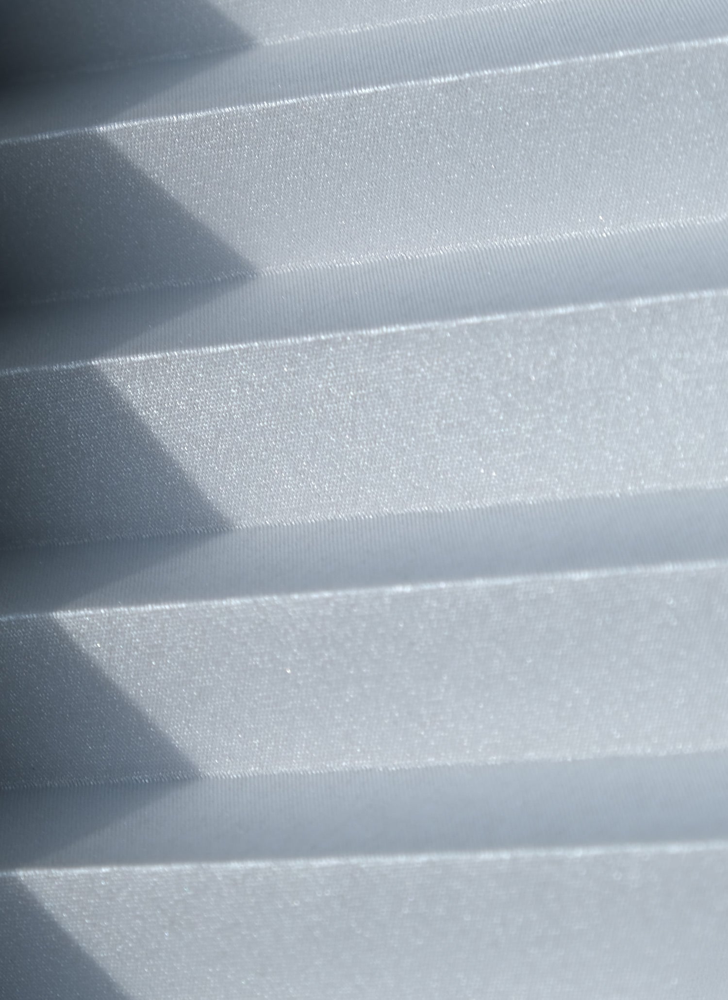 Nahaufnahme der Thermo-Beschichtung auf der Plissee-Rückseite